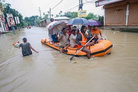 Flood in Tripura: Flood-affected people being moved to a safer place 